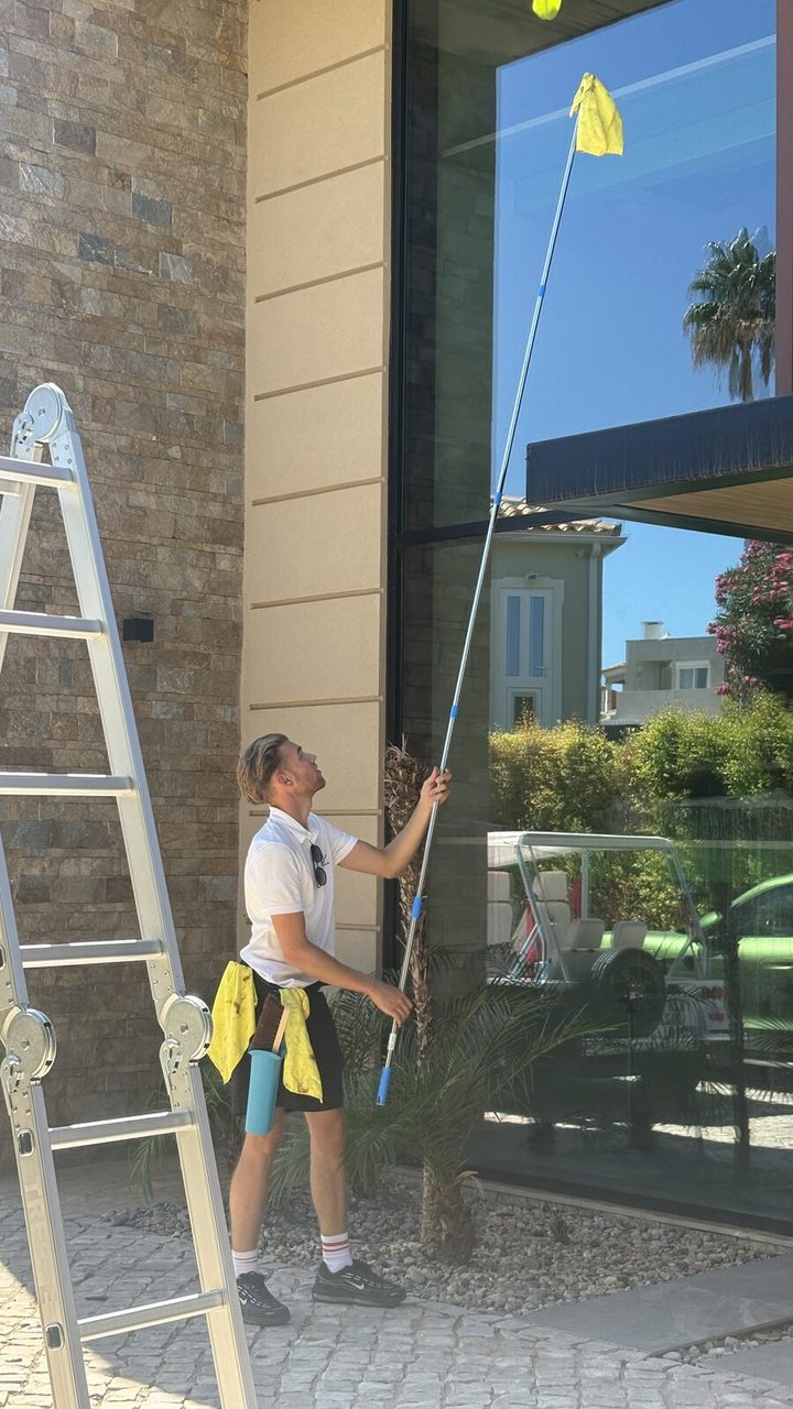 Ladder and pole window cleaning at a villa in Vale Formoso, Almancil